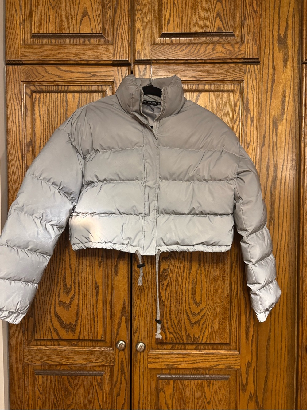 PrettyLittleThing Cropped Puffer Jacket in reflective silver size 4